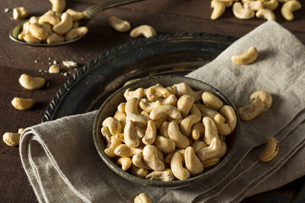 Raw organic white chashew nuts in a bowl